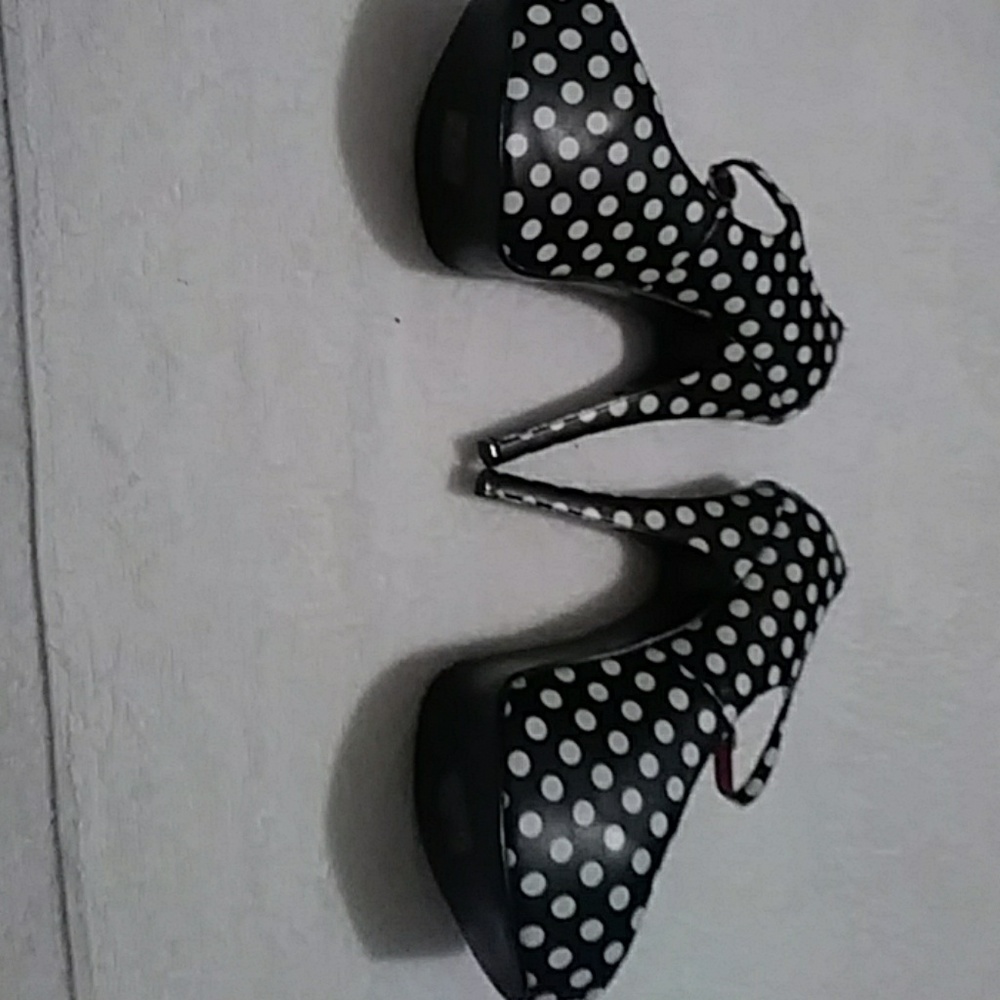 High heels have small scuff on back of heel.Very g